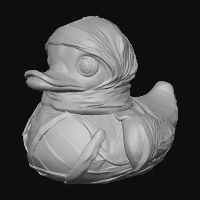3D model for A menacing rubber duck, re-imagined as a mummified creature, features an aged, off-white surface with a dry, slightly crinkled texture. Its body is haphazardly wrapped in linen-like bandages, partially obscuring the familiar duck silhouette. Faint sepia-toned yellow plastic subtly shows through gaps in the wraps, hinting at its original form. The eyes are deeply recessed, appearing hollow and devoid of life, contributing to its eerie, ancient appearance.


  Optimized for 3d printing