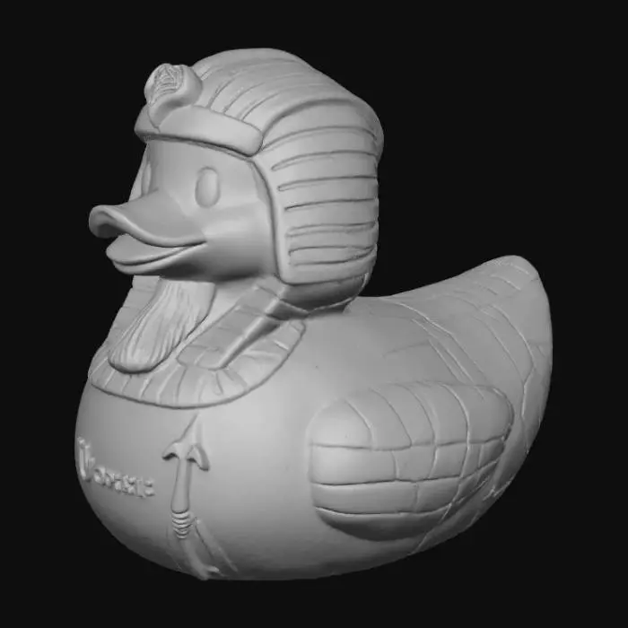 3D model for A Pharaoh-themed mummified rubber duck, solid 3D model for printing. The classic rounded duck body is partially wrapped in aged, linen-like bandages, revealing hints of faded gold plastic beneath. The duck wears an ancient Egyptian Nemes headdress, bold and stylized, with a sculpted ceremonial beard extending from the beak. Deeply recessed, hollow eyes add a mysterious, undead aura. Its wings are adorned with carved hieroglyphic patterns and embossed ankhs, worn as if by centuries of age. Across the chest, a chunky staff and crook are crossed, partially entangled in the bandages. The surface features subtle cracks and simple geometric engravings for texture. The model should be watertight, with bold, durable forms and no thin or fragile elements.
optimized for 3d printing