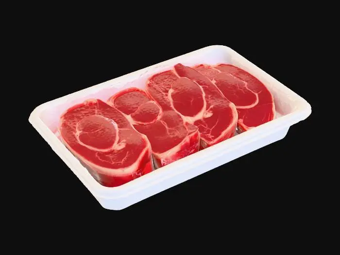3D model for Hyper-realistic New York strip steak tray pack (generic supermarket). White polystyrene foam tray with raised lip, absorbent pad, 1–2 NY strip steaks: deep red muscle with visible fat cap, fine marbling, slight moisture sheen, clean cut edges. Tight clear cling film wrap: stretched, crinkled corners, seal wrinkles, tiny trapped air bubbles, subtle condensation, realistic glare/distortion over meat. Front label sticker with placeholders: “BIG-BOX GROCERY”, cut name “NEW YORK STRIP STEAK”, weight, price/lb, total price, packed-on/sell-by dates, safe handling box, barcode+QR (fake), lot code, small icons. Sticker edges slightly lifted, micro-wrinkles, adhesive bleed. Minor wear: fingerprints, dust specks, light tray scuffs. PBR-ready: clean UVs, hi-res textures, correct plastic transmission/r