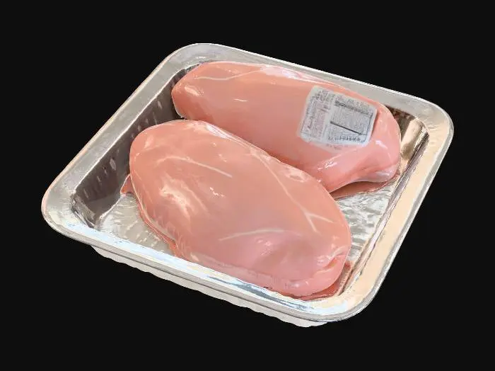 3D model for Hyper-realistic raw chicken breast tray pack (generic supermarket). White polystyrene foam tray with raised lip, absorbent pad, 2–3 chicken breasts with realistic moist sheen, pale pink variation. Tight clear cling film wrap: stretched, crinkled edges, seal wrinkles, tiny trapped air bubbles, slight condensation droplets, realistic glare/distortion. Front label sticker with placeholders: “PAUL-MART”, weight, price/lb, total price, packed-on/sell-by dates, safe handling box, barcode+QR (fake), lot code, small icons. Sticker edges slightly lifted, micro-wrinkles, adhesive bleed. Minor wear: fingerprints, dust specks, light tray scuffs. PBR-ready: clean UVs, hi-res textures, correct plastic transmission/roughness, foam microtexture, subsurface on meat. Neutral studio lighting, centered