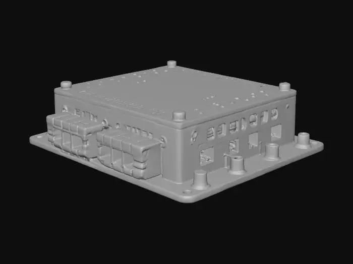 3D model for A modular circuit relay node, featuring a distinct retro-futuristic design with a corporate tech aesthetic. Its sturdy, high-poly casing appears to be made of a polished, dark gray composite material, accented by various labeled ports and connectors. Numerous small, translucent diagnostic LEDs are strategically placed, some emitting a subtle, rhythmic blink, suggesting active data flow. The texture is smooth, with finely etched labels beside each port, indicating a blend of practical functionality and sophisticated, almost futuristic, industrial design.