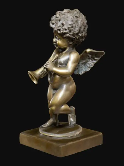3D model for The object is a detailed bronze sculpture of a cherubic figure with curled hair, textured wings, and a smooth, polished surface, holding a trumpet and posed dynamically., 
