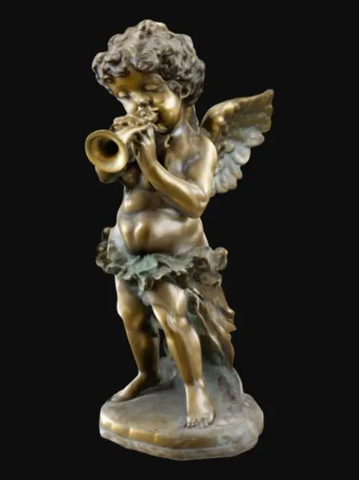 3D model for The bronze cherub statue is depicted as a young, chubby child with curly hair, delicately sculpted facial features, and small angelic wings on its back. It is in a dynamic pose, appearing to float or fly, with one leg bent and the other extended. The cherub is playing a small trumpet, holding it with one hand while the other arm is stretched outward, holding a flowing ribbon-like cloth. The style is reminiscent of Baroque or Rococo art, with intricate detailing and a sense of movement. 
