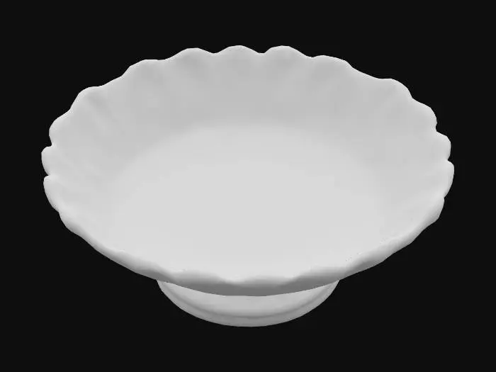 3D model for A vintage Art Deco candy dish crafted from carnival glass, its shallow bowl etched with concentric sunburst patterns that ripple outward from the center. The dark, glassy base bursts with iridescent flashes of emerald, ruby, cobalt, and gold, the rainbow oil-slick sheen shifting with every curve and engraved line. White background.