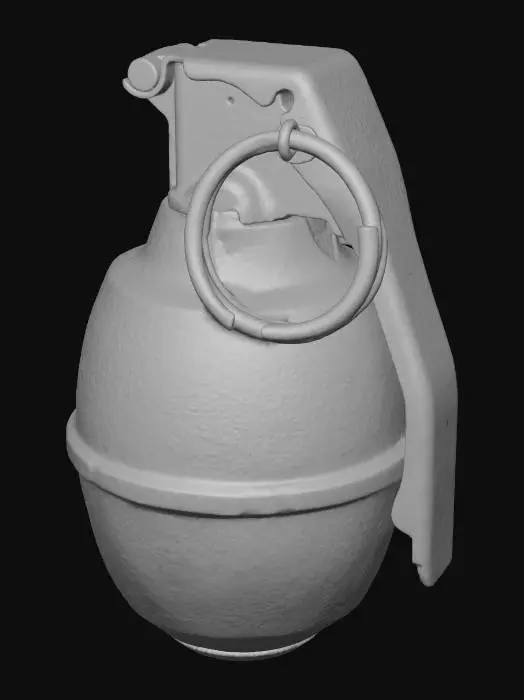 3D model for A worn Dieselpunk grenade, shaped like a small, ribbed cylinder of dark grey cast iron, with a heavy brass pin. Its surface is painted with a bold, irregular pattern of bright pink and black stripes, contrasting sharply with its destructive purpose. The metal feels rough and cold, with a tactile sense of its weight.