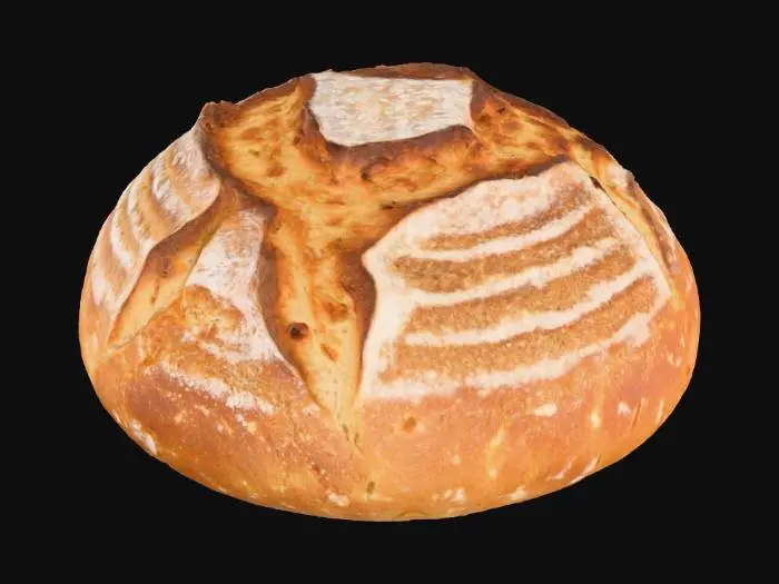 3D model for A freshly baked artisan bread loaf, oval-shaped with a deeply scored, rustic top crust that is golden-brown and slightly charred in places. The surface texture is coarse and crackly, revealing a hint of the airy, irregular crumb inside. Fine dusting of flour may cling to its uneven exterior. It feels firm and warm, with a satisfyingly crusty tactile quality, hinting at a soft, aromatic interior.
