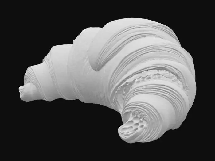 3D model for A fluffy, golden-brown croissant, distinguished by its crescent shape and numerous visible layers of delicate, flaky pastry. The exterior is crisp and slightly uneven, with a gentle gloss from an egg wash. Its interior, revealed where it might be torn, shows an airy, open crumb structure. The color is a warm, inviting golden-tan. It feels light and brittle to the touch, with a fine, buttery texture throughout.