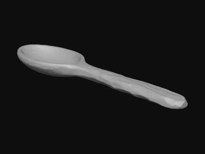 3D model for A rustic, hand-carved wooden spoon, fashioned from light-colored, grainy maple wood. Its bowl is smooth from use, while the handle retains a slightly rougher, tactile texture, showing the individual knife marks. The natural wood color varies from cream to pale brown, highlighting its organic structure and warm, earthy appeal, perfect for an old kitchen.
