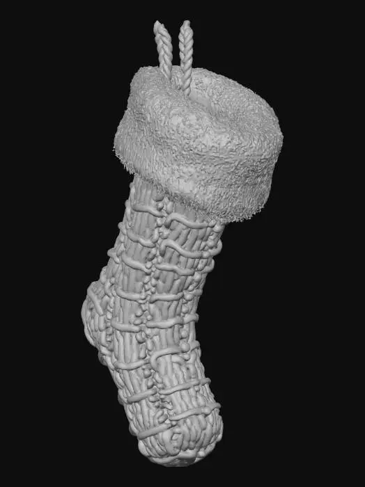3D model for A cozy Christmas stocking, knitted from soft, chunky scarlet red yarn, featuring a generous, fluffy white faux fur cuff at the top. Its traditional large sock shape is designed to hang by a sturdy loop sewn into the cuff. The texture is incredibly warm and plush to the touch, inviting a snug feel. A subtle braided pattern runs down the leg, adding to its handmade charm.