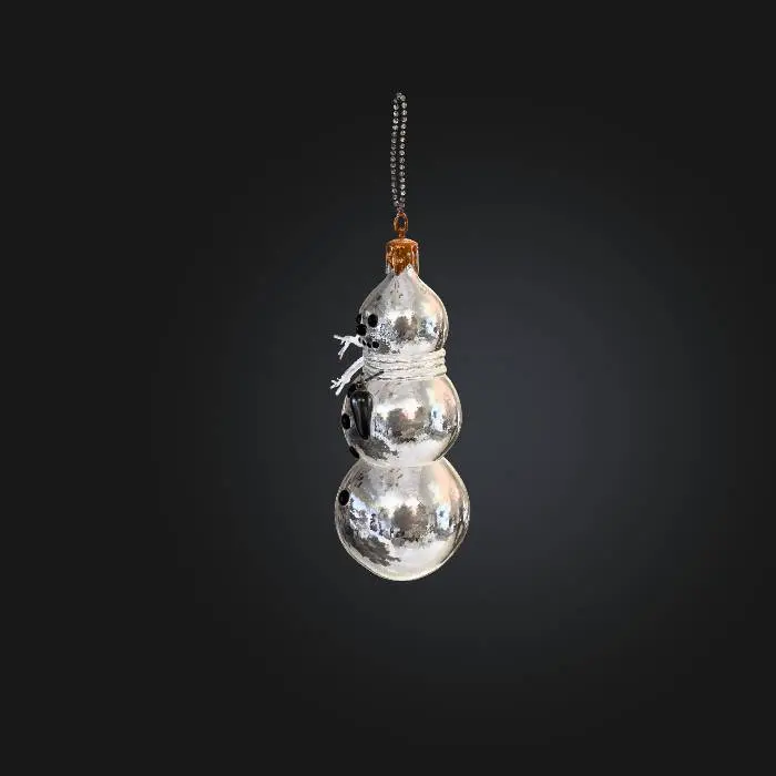3D model for A sparkling glass snowman ornament, made from translucent, slightly frosted white glass with a smooth, cool touch. It comprises three stacked spheres, with tiny black beads for eyes and mouth, and a miniature orange glass carrot for a nose. A thin, delicate silver scarf is painted around its neck, and a small, almost invisible loop is fused to the top for hanging.