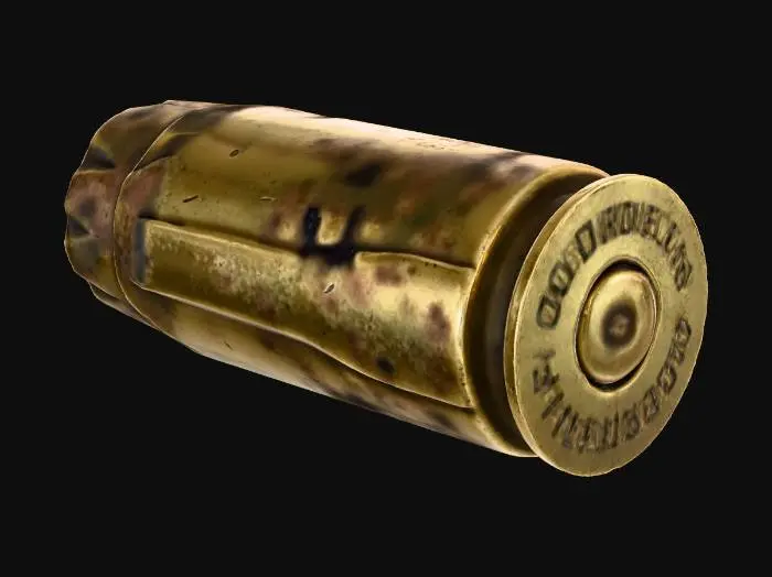 3D model for Một vỏ đạn đã qua sử dụng, có hình trụ rỗng, màu vàng đồng với bề mặt hơi xỉn và có thể có các vết xước nhỏ hoặc biến dạng nhẹ do quá trình bắn. Phần đầu hơi loe ra, và đáy vỏ đạn có dấu vết của chốt kim hỏa, tạo ra một vết lõm tròn rõ ràng trên bề mặt kim loại.