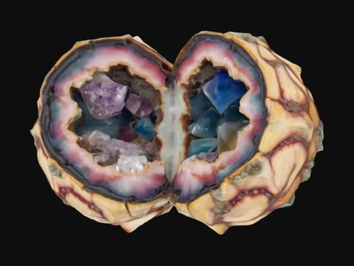 3D model for [OREGON] A large thunderegg split in half showing the beautiful inside, with lots of colors and crystals. 
, #AroundTheWorld#