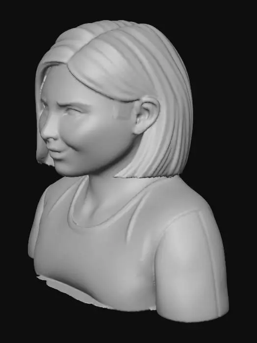 3D model for A white British woman named Karen. She is aged 30 has caramel-blonde bob cut hair, fairly large blue eyes, a fairly rounded head. She is wearing a black t-shirt with pale teal-blue sleeves.