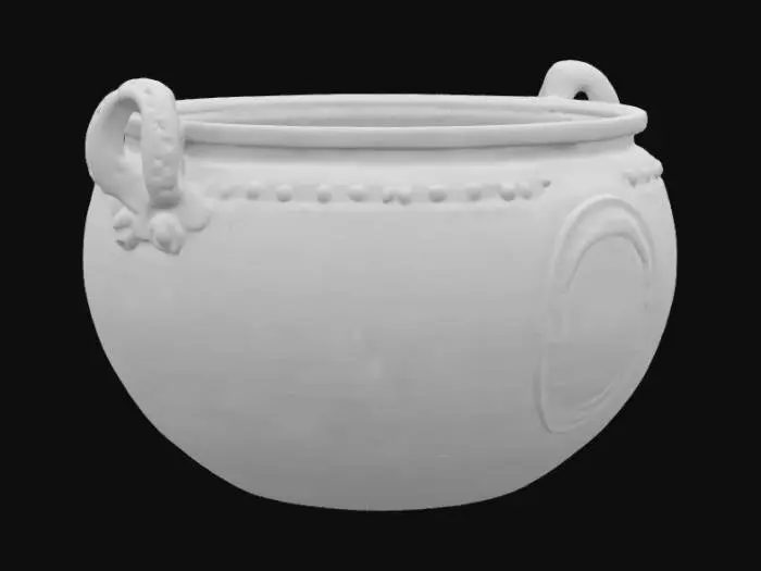 3D model for Большой казан из средневековой замковой кухни, выкованный из толстого, тяжелого чугуна, имеет сферическую форму с широким устьем и массивными, приклепанными ручками по бокам. Его поверхность черная и шероховатая, покрытая местами плотным слоем копоти и следами окалины, что придает ей глубокую, текстурированную патину. Казан выглядит прочным и массивным, его металл кажется холодным и грубым на ощупь. Изнутри он гладкий, но тоже темный от многолетнего использования.
