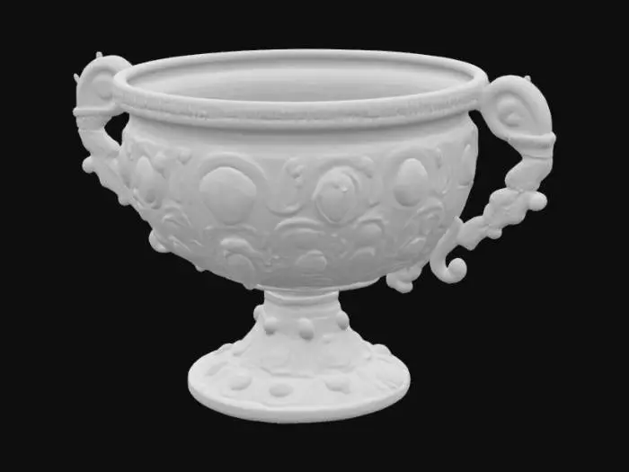 3D model for Великолепный средневековый золотой кубок, искусно изготовленный из тяжелого,  золота с гладкой, прохладной поверхностью. Его массивная чаша и витиеватая ножка богато украшены искусно ограненными драгоценными камнями: глубоко-зелеными изумрудами, ярко-синими сапфирами и огненно-красными рубинами, каждый из которых ощущается твердым и граненым. Золото деликатно украшено витиеватыми узорами, придающими ему богатый, текстурированный вид, намекающий на древнее мастерство и роскошное предназначение. 4к, гиперреализм, кристалы, ультрадетализрованный
