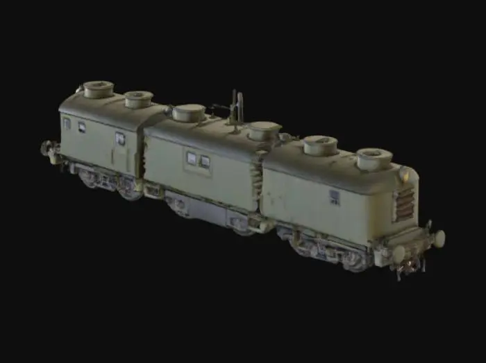 3D model for Un tren blindado de aspecto imponente y robusto, con vagones rectangulares fabricados en acero grueso y pesado. La superficie metálica presenta remaches prominentes y soldaduras visibles, dándole una textura dura y resistente al tacto, con posibles arañazos o marcas de desgaste. Predomina un color verde oliva oscuro o gris militar, con acabados mate que absorben la luz. Su estructura es angular y funcional, con torretas de cañón y ventanillas estrechas, diseñadas para máxima protección.