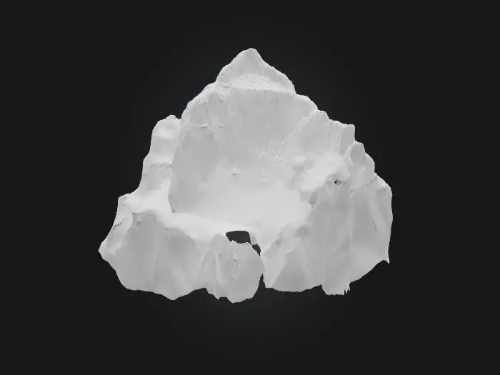 3D model for Una montaña imponente y majestuosa, con picos escarpados y laderas inclinadas compuestas por roca sólida y tierra compacta. Su superficie es irregular y rugosa, presentando estratificaciones visibles, grietas profundas y parches de vegetación densa o escasa. Los colores varían desde grises oscuros y marrones terrosos en la base, hasta verdes intensos de la flora y blancos puros de la nieve en la cumbre, ofreciendo un contraste natural. Es dura y fría al tacto.