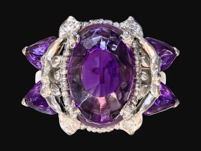 3D model for A platinum Amethyst  ring, tourmaline is in oval stepped cut , elegant vivid purple colore and transparent, four pieces of pear shape diamonds on each side of the main stone,small round and princess cut diamond are decorated among the pear shape diamonds