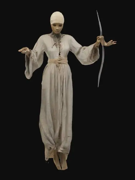 3D model for The object is a humanoid figure with a roughly humanoid shape, dressed in a tattered, aged dress, featuring smooth and worn textures with a metallic hook-like tool in one hand.has a full bandage on his head. is flying a little bit