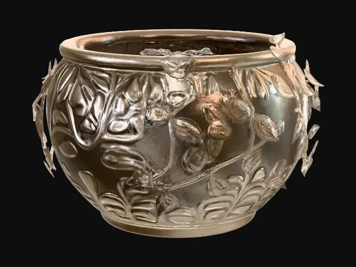 3D model for Create a plant pot at least 200mm round. Include themes such as leaves and vines.