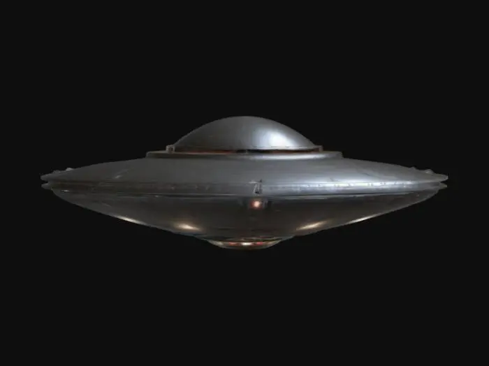 3D model for Flying Saucer (UFO): A sleek, hovering UFO with classic saucer shape, raised metallic surfaces, deeply recessed panel lines, glowing lights along the edges, and a textured, alien-engineered surface with small, recessed portholes