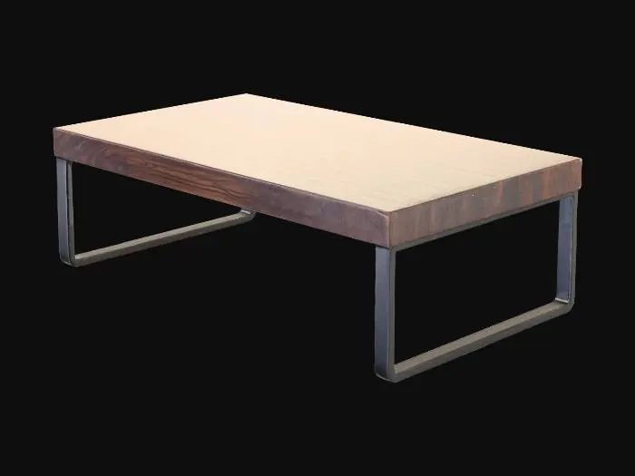 3D model for A modern coffee table, rectangular in shape with clean, sharp edges. Its tabletop is a smooth, polished dark walnut, revealing a rich, intricate grain pattern that feels cool and hard to the touch. The table is supported by sturdy, cylindrical legs made of brushed black metal, providing a sleek contrast to the wood. The metal has a slightly matte finish, offering a subtle texture, while the overall structure is robust and grounded.