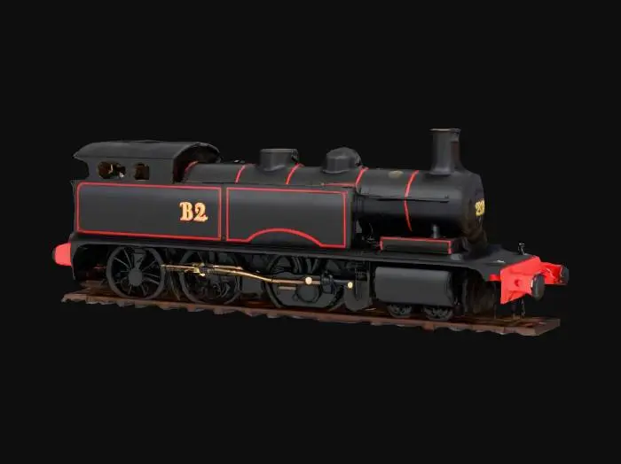 3D model for "A highly detailed 3D model of a Peckett B2 class 0-6-0ST industrial saddle tank steam locomotive number 24 in Swanage Railway livery: glossy black with red lining and buffer beams, gold number 24 and lettering on cab and tank sides, tall chimney, rounded saddle water tank over boiler, open cab with crew, spoked driving wheels, red front buffer beam with plaque, realistic heritage steam engine style, side view on track, high poly, photorealistic textures"