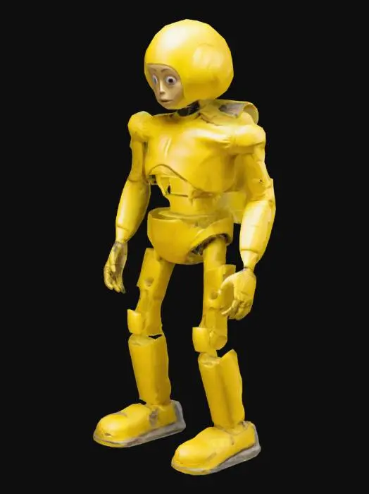 3D model for A test crash dummy in its yellow color, standing on a stone pedestal. The dummy is positioned as if ready for impact, with a neutral expression and lifelike proportions, giving the impression of being in a dynamic pose.