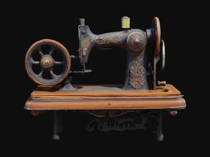 3D model for An antique sewing machine with a large, hand-operated wheel on the side for manual operation. The machine is mounted on a sturdy wooden table with elegant carvings, combining functionality and vintage charm. Its cast iron frame features intricate patterns, while the long, narrow sewing arm extends outward, ending in a precise needle mechanism. The design reflects the craftsmanship of a bygone era, blending utility with timeless elegance