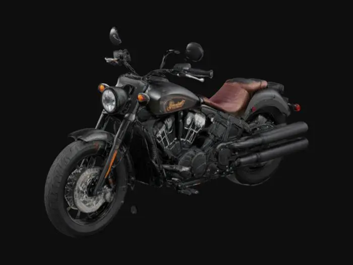 3D model for The Indian Scout Bobber is a powerful, muscular cruiser featuring a low-slung, aggressive stance. Its compact frame is accentuated by minimalist fenders, wide tires, and a sleek matte-black finish. A rounded headlight sits between broad handlebars, while a distinctive exposed V-twin engine dominates the center. The seat is low-profile and solo-styled, complementing its rugged aesthetic. Its exhaust pipes are short, angular, and chromed, producing a deep, resonant growl.