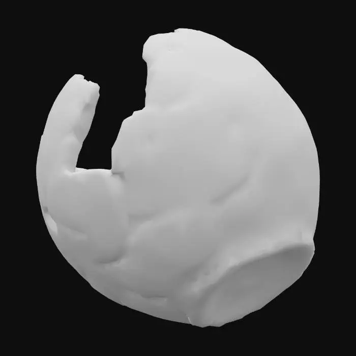 3D model for A broken cannonball is a spherical fragment of matte black cast iron, torn in two by an uneven, jagged fracture. Its surface is rough and gritty to the touch, covered in reddish-brown rust spots that give it a porous, corroded texture. The internal surface of the fracture exposes a darker, granular metal structure with sharp, uneven edges that appear crumbly.