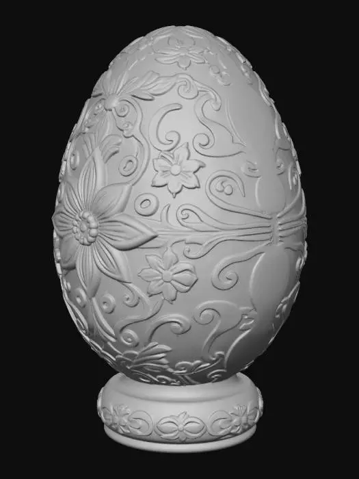 3D model for A beautifully designed Easter egg with intricate floral engravings, symmetrical patterns, smooth curved surface, embossed details, elegant ornamental style, high detail, clean geometry, 3D printable, solid base, no textures, soft rounded edges, aesthetically pleasing