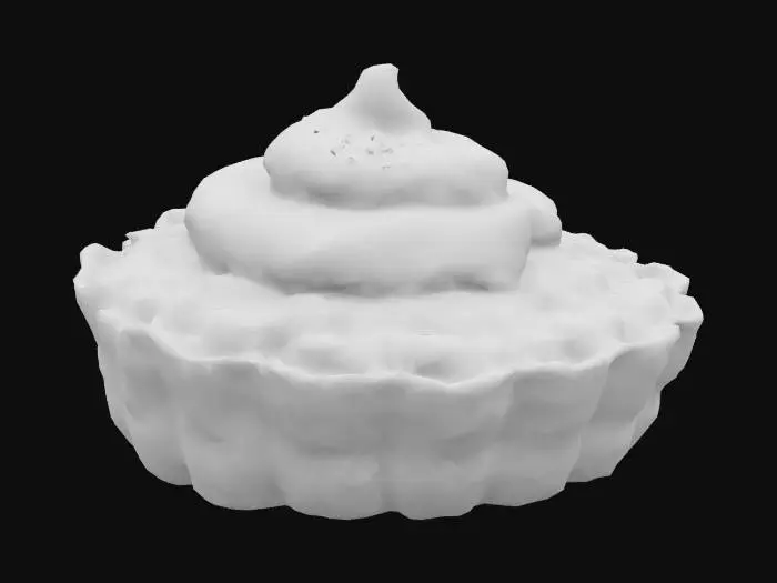 3D model for A mini round corn cake, golden yellow with crispy edges and flecks of whole corn visible in the soft center. A swirl of avocado crema—pale green, velvety with a faint sheen—sits on top, crowned by a dusting of ancho chili powder.
