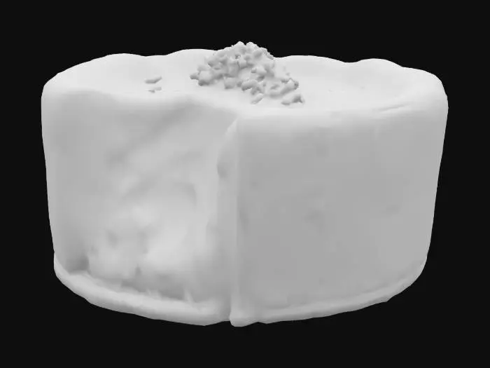 3D model for A mini Basque-style burnt cheesecake made with creamy cheese and teff flour—rich golden edges with a soft center. Topped with a glossy drizzle of acacia honey and a pinch of crushed fenugreek seeds for a savory touch.