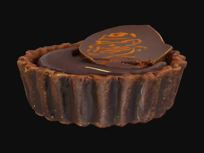 3D model for A small dark chocolate tartlet square with a crisp cocoa crust and ganache infused with Moroccan Ras el Hanout spice blend (notes of cinnamon, nutmeg, cardamom). Finished with a gold-swirled chocolate shard and a dusting of paprika sugar.