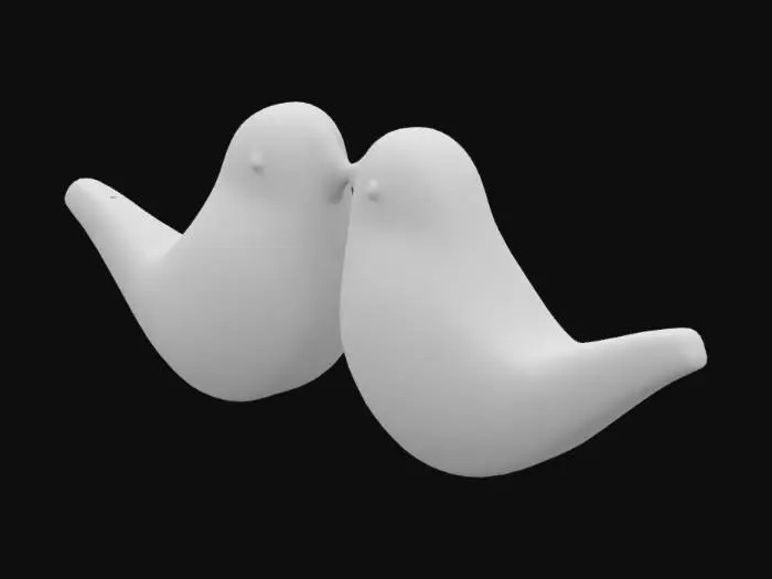 3D model for Generate a 3D model of two carved wooden lovebirds resting side by side. The birds should be small, rounded, and slightly abstract, with their heads gently tilted toward each other. Use light-colored wood such as maple or beech, with a matte or lightly polished finish. Display on a floating shelf with warm natural lighting and a soft background.
