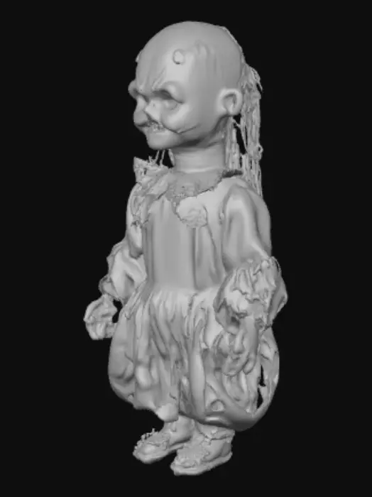 3D model for An ominously evil cursed doll, crafted from aged, porcelain-like material, has a cracked, pale white face marred by unsettling dark streaks. Its once pristine surface is now gritty and cold to the touch. Deep, hollow eye sockets stare blankly, hinting at a malevolent presence, while its small, painted mouth is fixed in a subtle, disturbing smirk. Its fabric body, made of dark, discolored velvet, feels stiff and unyielding, adorned with tattered, grimy lace.