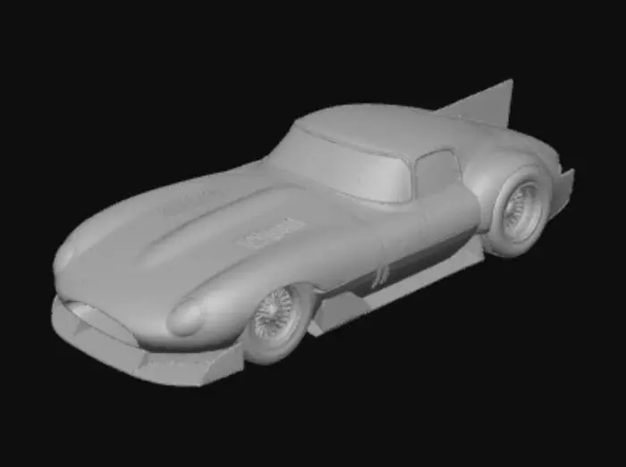 3D model for An ultra-realistic, highly detailed image of an extreme widebody 1954 Jaguar D-Type speedster, with oversized rear tires, and an aggressive stance. It has an aerodynamic body kit with deep side skirts, extended wheel arches, and a full diffuser setup, with a lowered and stretched Jaguar D-type speedster silhouette, stretched lengthwise, and Liberty Walk Mitsuoka Orochi racing modifications, blended with vintage racing flair and livery. Pearlescent extreme metalflake marine blue paint contrasts with cream lacquer accents, showing wear textures. Retro turbine-style wheels are wrapped in cheater slicks featuring the word Highballin' in raised white lettering. Three quarter perspective, ultrarealistic render with 35mm lens depth.  -ar 16:9 --style raw