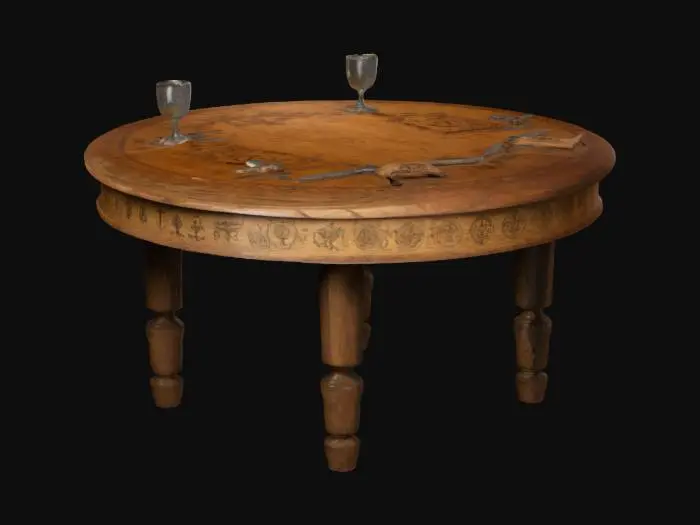 3D model for A round wooden table with engraved faction symbols for the Vignerons and Pêcheurs. Scrolls, goblets, and daggers are scattered on the surface.