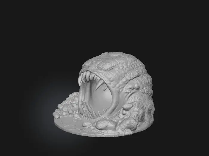 3D model for "A 3D model of a monstrous cave entrance resembling the lair of a legendary Korean Imugi. The rocky formation looks unnatural and ominous, shaped like gaping jaws with jagged stone teeth around the opening. Dark, wet stone textures glisten with moisture, covered in moss, algae, and faint glowing fungi that add an eerie supernatural atmosphere. The cave mouth is huge and shadowy, exuding a yokai-like aura, as if a giant serpent or sea monster lurks inside. Designed as a standalone cave entrance model for a world map, with exaggerated and terrifying details that blend myth and horror."