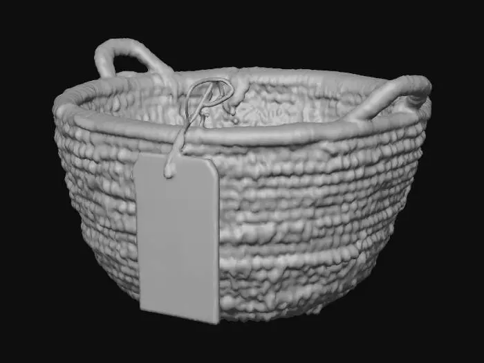 3D model for Base Mesh: Oval/cylinder soft basket with woven texture.

Accessory: Hanging tag (rectangular card with ghost graphic + text).