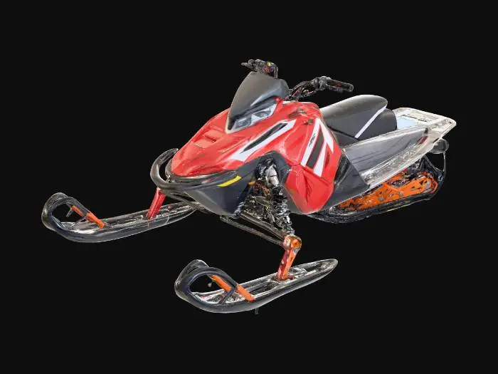 3D model for A realistic 3D model of a modern Polaris snowmobile. Sleek, angular body panels in red and black with white decals, yellow vent accents, and exposed suspension. Front skis are black with red arms, slightly curved upward, connected by detailed shocks, springs, and bolts. Include handlebars with textured grips, brake/throttle controls, and a small windshield. Long black padded seat with stitching, tapering into the rear tread system. Rear track should feature realistic rubber treads, rollers, and suspension arms with red side rails. Use PBR textures: glossy paint, matte rubber, metallic shocks. Optimized for Unreal Engine 5. Standalone asset, no background.