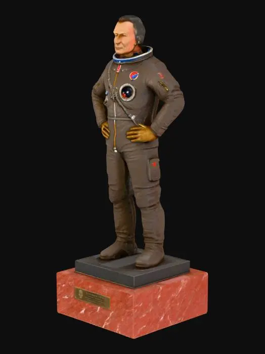 3D model for Gherman Stepanovich Titov was a Soviet cosmonaut who, on 6 August 1961, became the second person to orbit the Earth in the Vostok 2 spacecraft. I would like a bronze statue of him wearing his spacesuit but not wearing his helmet. The figure should stand on a red granite pedestal. A commemorative plaque bearing the words 'Astralsilber' should be attached to the front of the pedestal.
