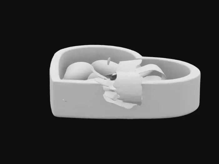 3D model for A romantic heart-shaped gift box with intricate embossed patterns, wrapped in a silky ribbon with a delicate bow. The box is slightly open, revealing luxurious chocolates inside, each with a glossy finish and tiny heart decorations. The material of the box is elegant, with a soft velvety texture, perfect for a Valentine's Day surprise. , #valentine#