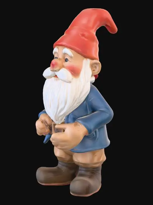 3D model for Ein kleiner, schelmischer Gartenzwerg aus glatter Keramik mit einer leuchtend roten Zipfelmütze und einem kurzen blauen Mantel. Sein kräftiger, weißer Bart ist detailreich modelliert, während sein nackter, runder Hintern frech in die Höhe ragt. Die Hautpartien sind in einem warmen Pfirsichton gehalten, während die Kleidung glatt und glänzend erscheint. Die Gesamtform ist gedrungen und stabil, mit einem glatten, kühlen Gefühl.