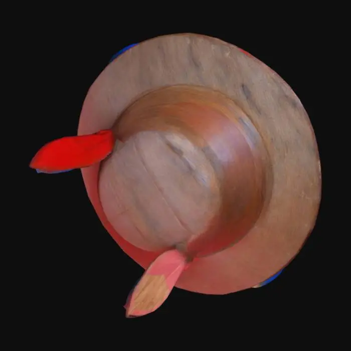 3D model for "Create a 3D model of Pinocchio, showing a half-body design from the waist up. The character should have a wooden puppet aesthetic, with visible wood grain texture on his face, arms, and chest. Include his iconic features, such as a long wooden nose, a red feathered hat, bright blue eyes, and a cheerful expression. Add details like jointed arms and a classic puppet outfit with suspenders, a bow tie, and buttons. The model should have realistic textures and vibrant colors, resembling a handcraf


