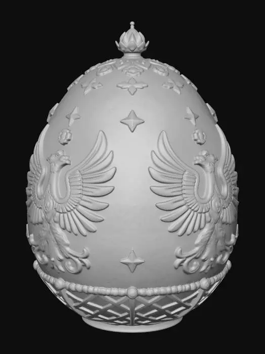 3D model for The Shell of Sovereignty
To gaze upon the closed egg is to look at a sun captive in metal. The exterior shell is a brilliant, blinding celebration of imperial power, designed to mimic the heavy gold cloth worn by the Empress during her coronation.
The Guilloché Sunburst: The master craftsmen layered translucent, shimmering lime-yellow enamel over a meticulously engraved guilloché background of starbursts. As light hits the curvature of the egg, it appears to radiate outward from deep within the shell.
The Trellis of the Romanovs: Encompassing the golden surface is a heavy trellis of pure gold bands, studded at every intersection with a flawless, brilliant-cut diamond.
The Imperial Eagles: Suspended within the golden grid are the double-headed eagles of the Romanov dynast #EasterEgg2026#