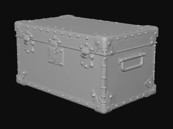 3D model for An old rectangular metal storage box made from riveted metal plates with reinforced corner brackets. The front center has a metal latch and lock loop, and both sides feature tubular metal handles attached with small plates. The surface shows oxidation and rust patches with chipped paint. The top is flat with rounded edges. The overall form is sturdy and solid with complete geometric details.