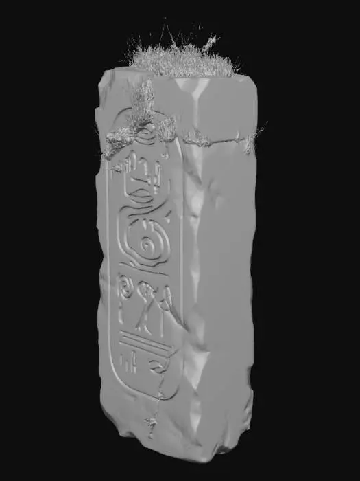 3D model for an ancient stone block that is standing tall as a rectanglular shape and dark blue in color. It has feint blue curved line heiroglyphic markings and is also topped with grass that appears to be growing from the top.