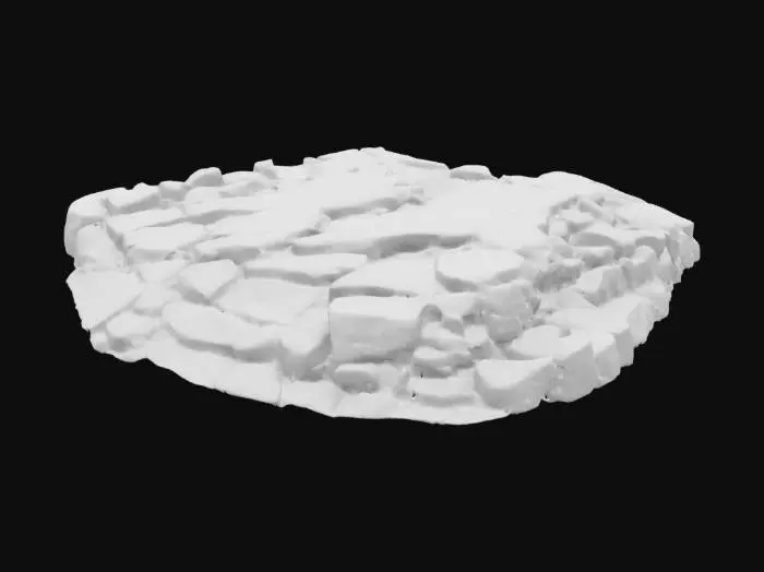3D model for A rugged, dark grey rocky ground, appearing as if part of a desolate island. The surface is uneven and textured, composed of large, irregular rock formations with sharp edges and visible cracks, suggesting a brittle, hard material like basalt or granite. contrast with the dark rock, indicating a cold or damp environment. The overall impression is one of a harsh, weathered, and unyielding terrain.